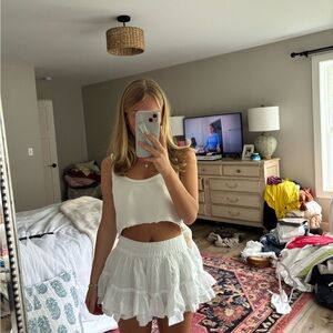 Anthropology white flowy lace skirt.